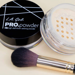 L.A. Girl compact open top view showing powder pan and sleek design