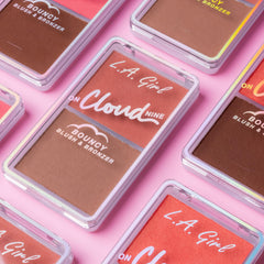 L.A. Girl compact held in hand showing pocket-friendly travel size