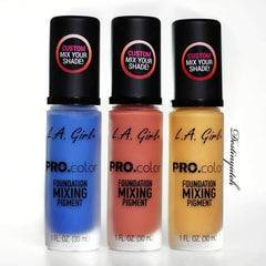 L.A. Girl pigment next to coin for size comparison showing portability benefit