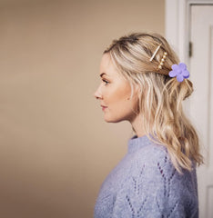 La Jolie Jasmin clip securing a half-up hairstyle for a neat, decorative hold