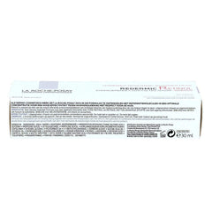 La Roche-Posay Redermic R dispensing a pea-sized amount demonstrating controlled retinol dosing