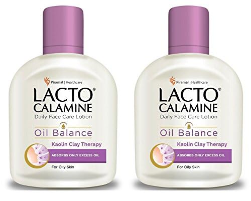 Lacto Calamine bottle held in hand demonstrating 120ml scale and travel-friendly size