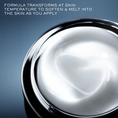 Lancôme night cream on bedside table in evening setting, suggests nightly restoration