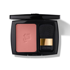 Lancôme compact front view showing blush pan and built-in brush for effortless application