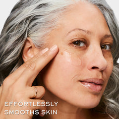 Lancôme primer on vanity with brushes showing professional-ready benefit