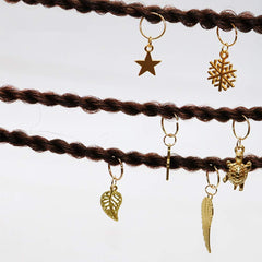 LASWISE styled braids with mixed charms showing fashionable finished look