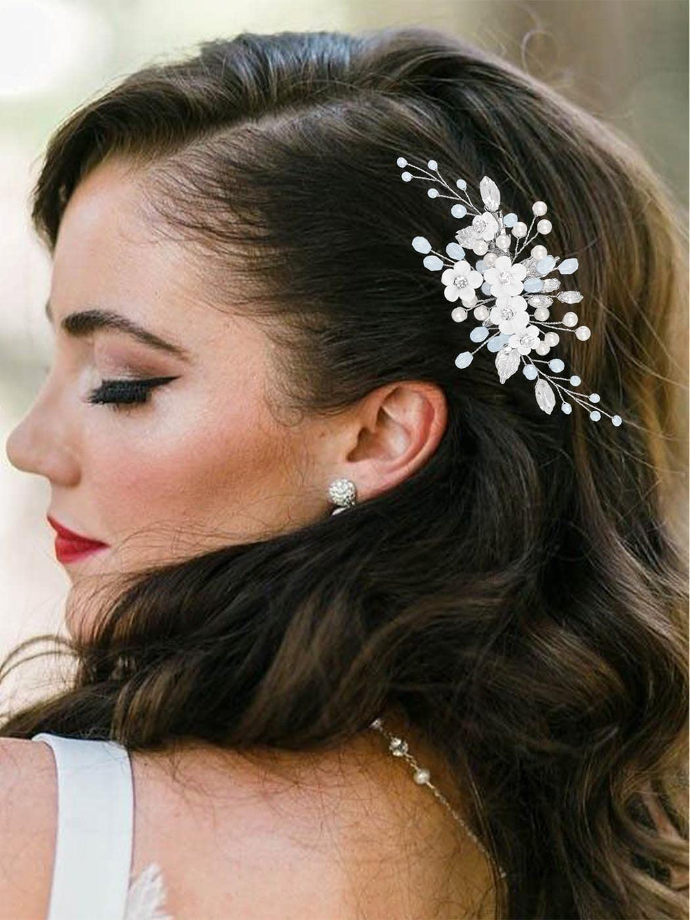 Latious hair clip worn in an elegant updo providing polished bridal finish benefit