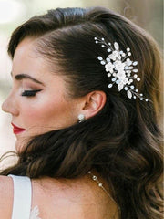 Latious hair clip worn in an elegant updo providing polished bridal finish benefit