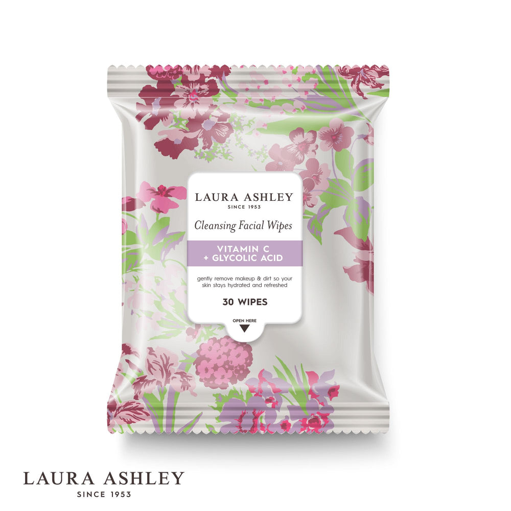 Laura Ashley pulling a wipe from pack demonstrating easy dispensing and convenience