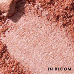 LAURA GELLER NEW YORK lifestyle shot by mirror illustrating natural radiance