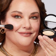 LAURA GELLER NEW YORK top-down open powder showing smooth domed surface