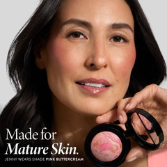 LAURA GELLER swatch of Tropical Peach on forearm showing buildable color