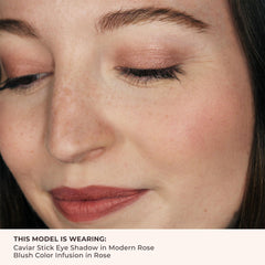 Laura Mercier blush applied on model cheeks showing natural flushed finish