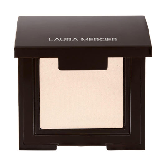 Laura Mercier compact front packaging showing product and label, showcasing premium design and ease of use