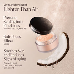 Laura Mercier powder in hand showing compact size for travel convenience