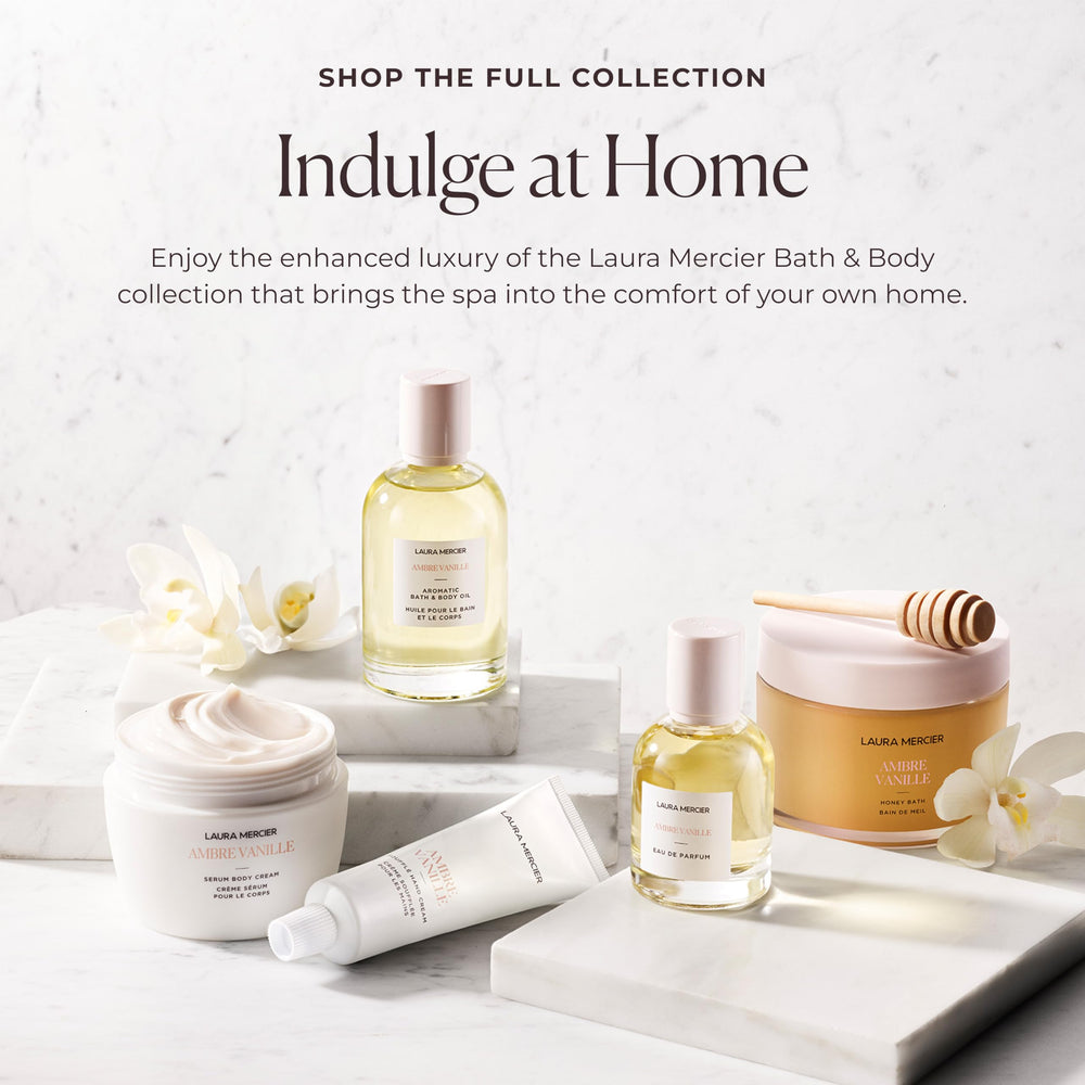 Lifestyle bathroom shelf with Laura Mercier cream conveying everyday luxury and routine enhancement benefit