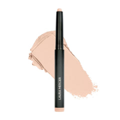 Laura Mercier front packaging showing Vanilla Kiss shade and stick design benefits portability