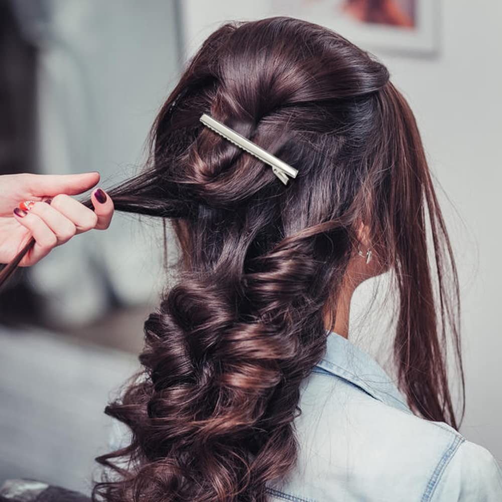 Lawie clips holding hair during styling showing professional salon benefit