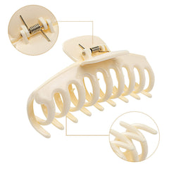LAXIZAR banana clip open in hand demonstrating large size and easy handling
