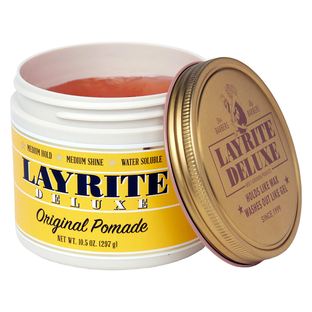 Layrite pomade close-up texture on fingertip, smooth paste for easy application