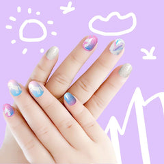 Laza nails in hand to show scale and short length, comfortable wear