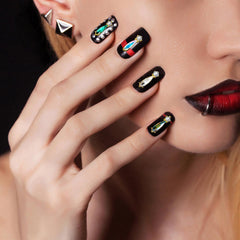 Leelosp gems applied on acrylic nails creating dazzling accent and event-ready shine
