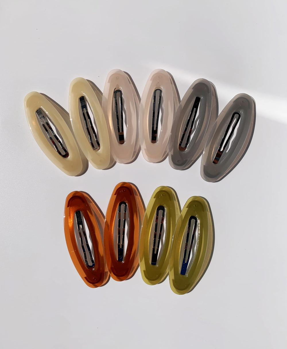 Lemeilleur metal clasp detail showing spring mechanism for secure hair grip