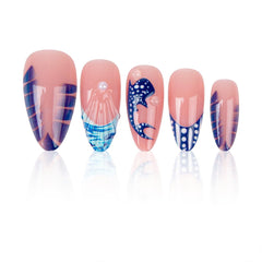 LFAAYYF hand model wearing ocean-themed nails at beach showcasing vacation-ready look