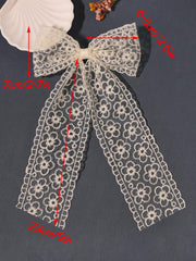 LFOUVRE barrette clasp mechanism view demonstrating secure, gentle hold