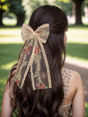 LFOUVRE bow long tails detail showing flowing tails for soft movement