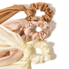 LFOUVRE scrunchie wrapped around a bun showing secure hold and gentle hair protection