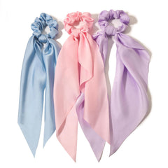 LFOUVRE front view of three satin scrunchies showing colors and style benefit