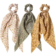 LFOUVRE front view of three floral scrunchies, adds vintage charm