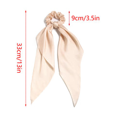 LFOUVRE model securing a ponytail with scrunchie showing quick polished styling benefit