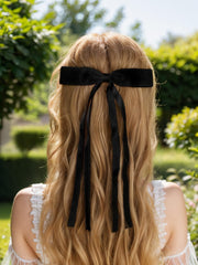 LFOUVRE clip worn in half-up hairstyle adding movement and polished look