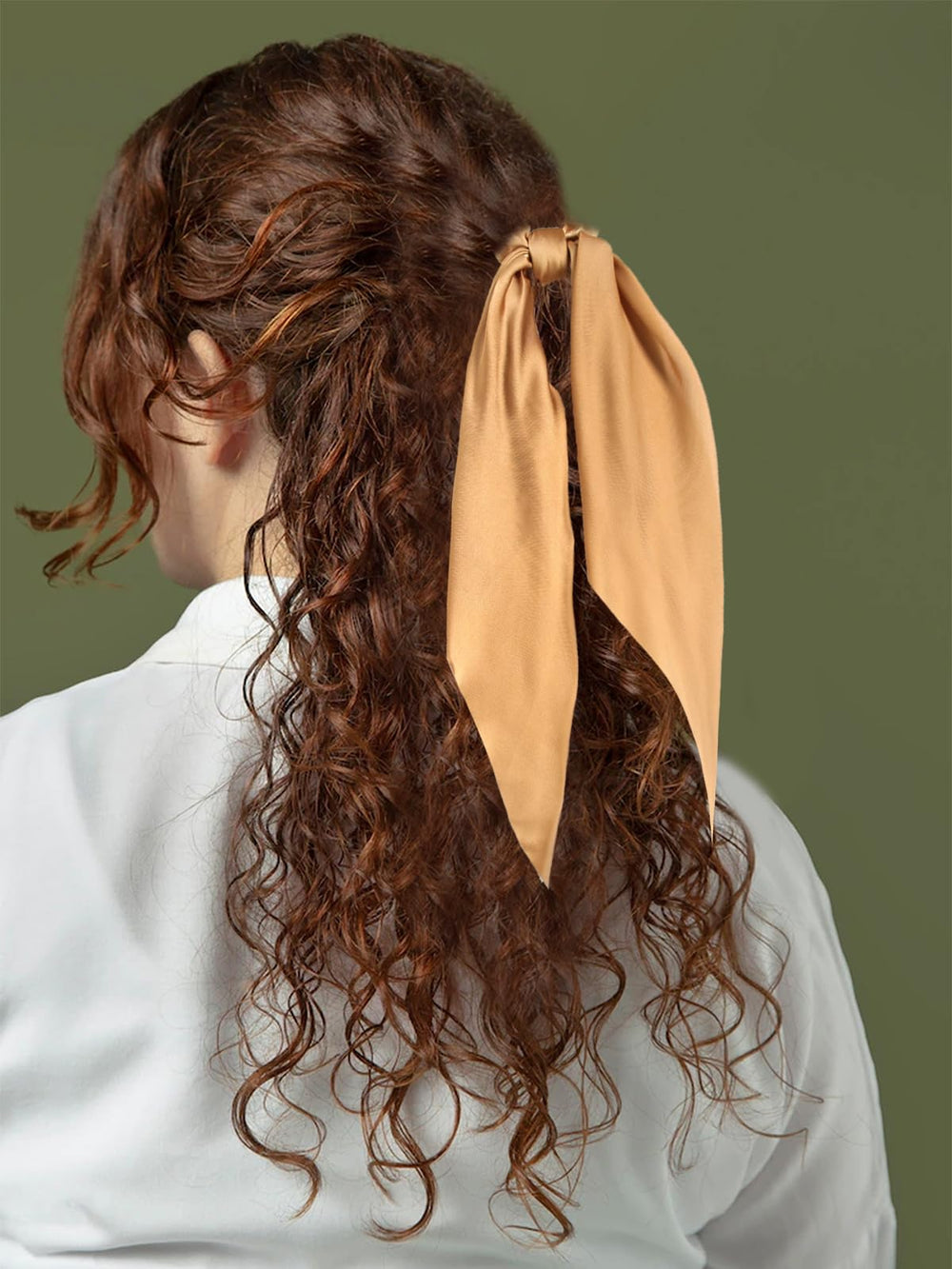 LFOUVRE knotted scarf detail highlighting the tied ribbon for instant bow-like styling
