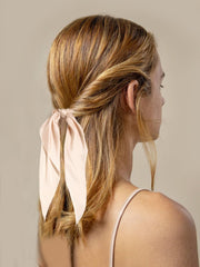 LFOUVRE scrunchie worn on wrist as bracelet showing accessory versatility and easy wear