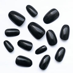 Lifextol lifestyle shot of woman wearing black almond nails for polished style