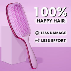 Lily England brush next to hand for scale showing compact travel-friendly size