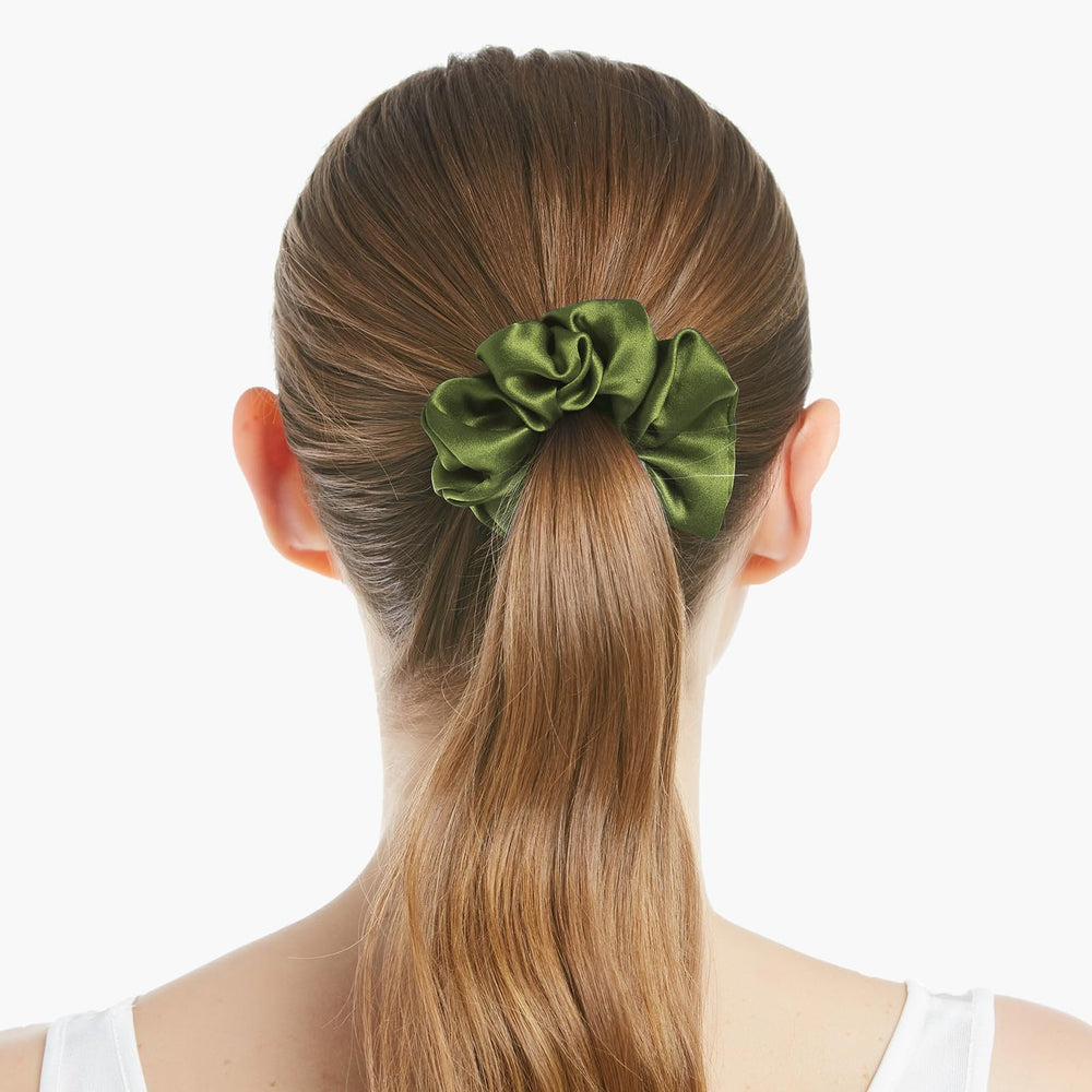 LilySilk scrunchy stretched to show elastic core strength and secure hold benefit