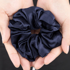 LILYSILK scrunchie on hand showing scale and easy, no-dent wearability