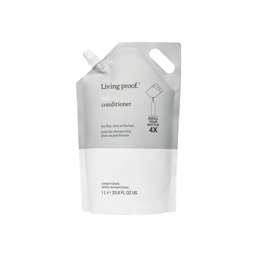Living Proof full conditioner front bottle shows product and volume benefit