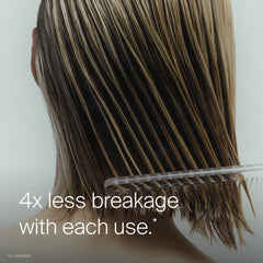 Living Proof being sprayed before brushing to reduce tangles and breakage