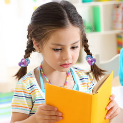 LIYAZHIL ponytail in use on a child showing secure no-pull styling