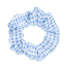 LOOKSEVEN scrunchie packed in a small travel pouch, convenient on-the-go