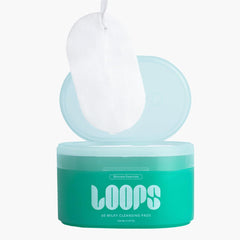 LOOPS pad held in hand to show scale and convenient single-use benefit