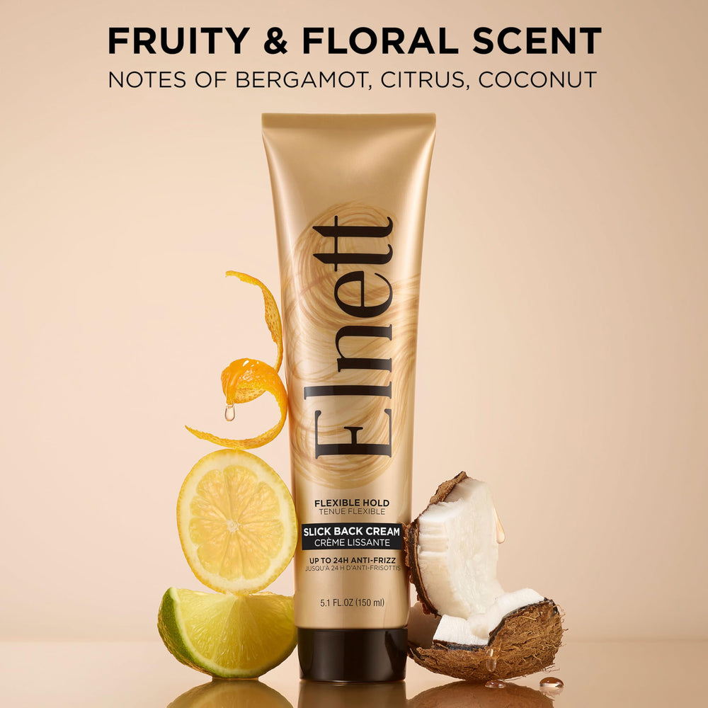 L'Oreal Paris applying cream to damp hair for sleek styling control