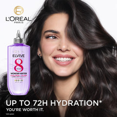 L'Oreal Paris Wonder Water being massaged into wet hair for eight-second hydration
