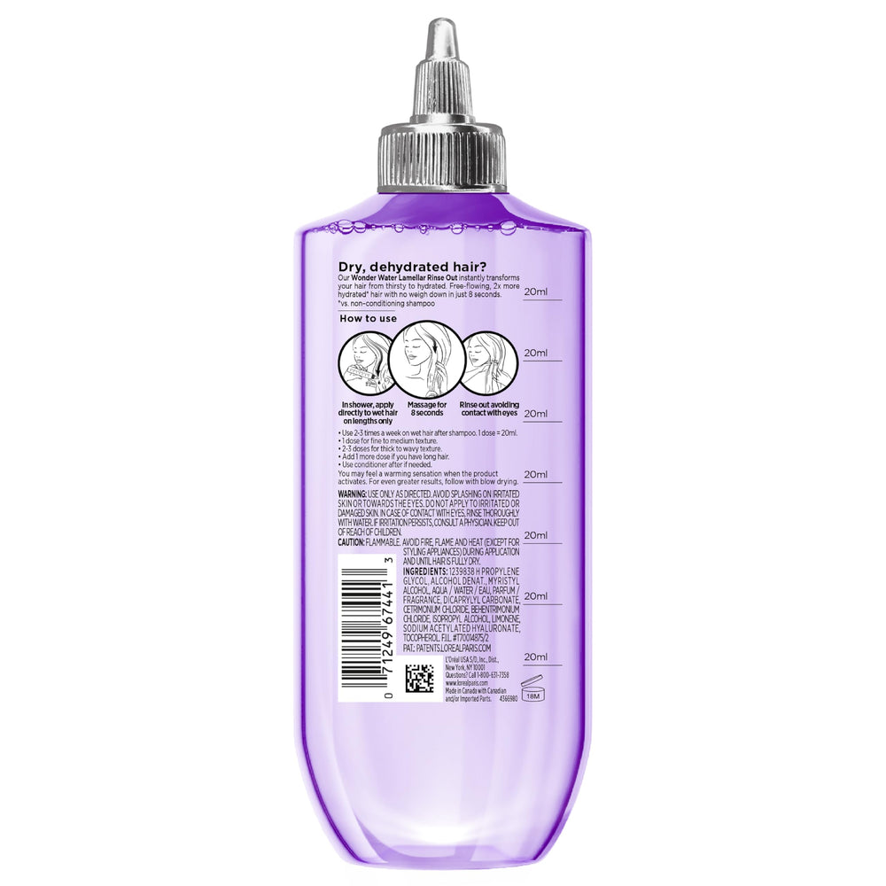 L'Oreal Paris Wonder Water size comparison next to hand showing travel-friendly 6.8 fl oz