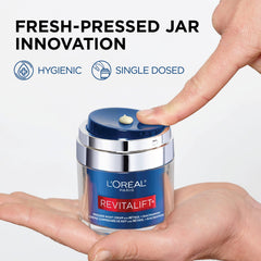 L'Oreal Paris 1.7 oz jar held to show scale and travel-friendly size